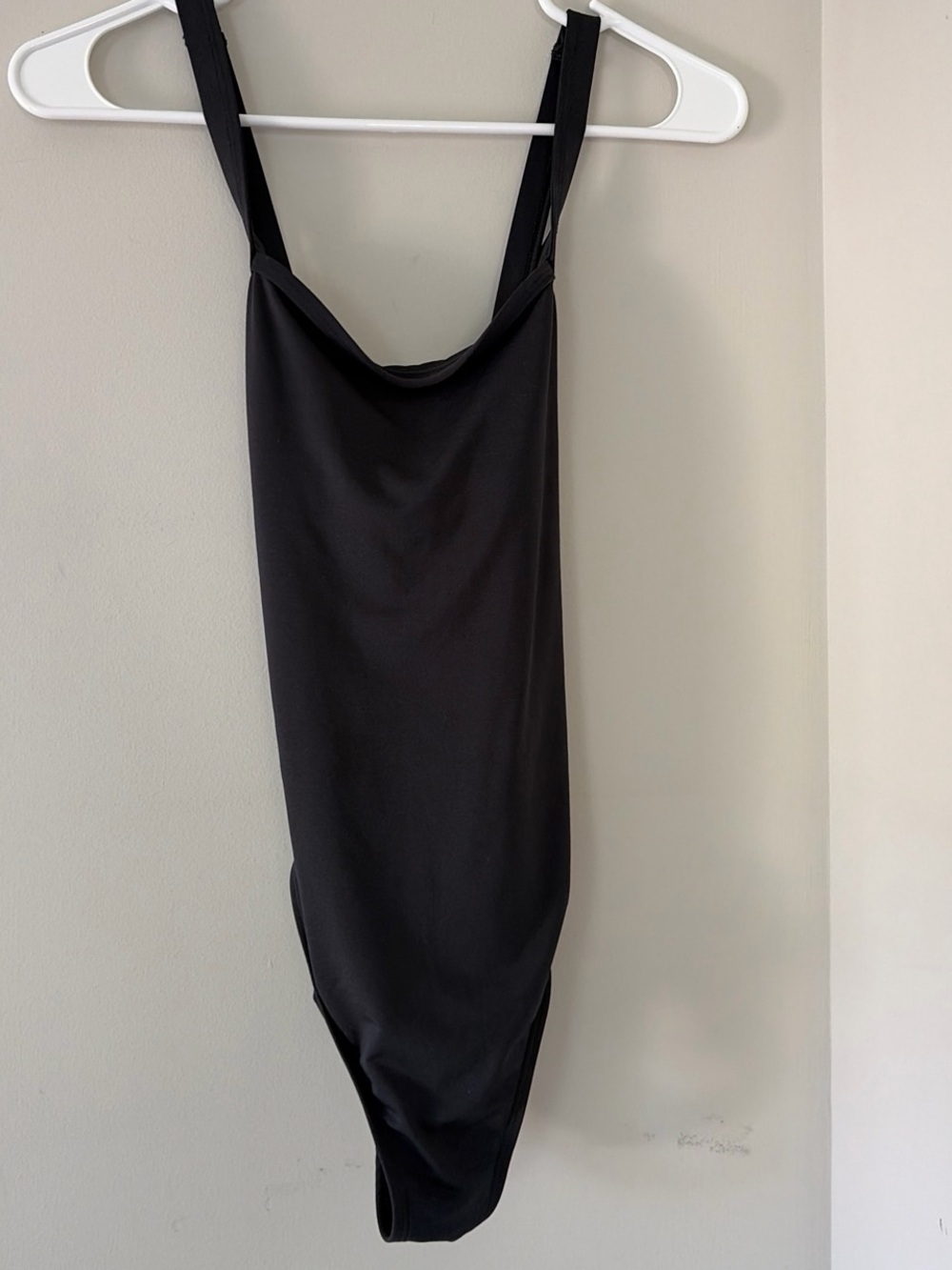 Carve Designs Black Swimsuit with Teal Logo